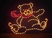 SITTING BEAR WITH SKATES