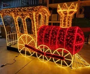 Train Car Photo Op with Garland Holiday Light Display