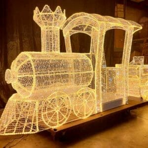 Train Engine Photo Op With Mesh Holiday Light Display