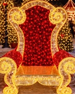 Illuminated red and gold Christmas throne chair